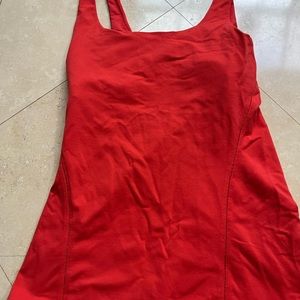 Lululemon tank top blood orange color size 4 excellent used condition